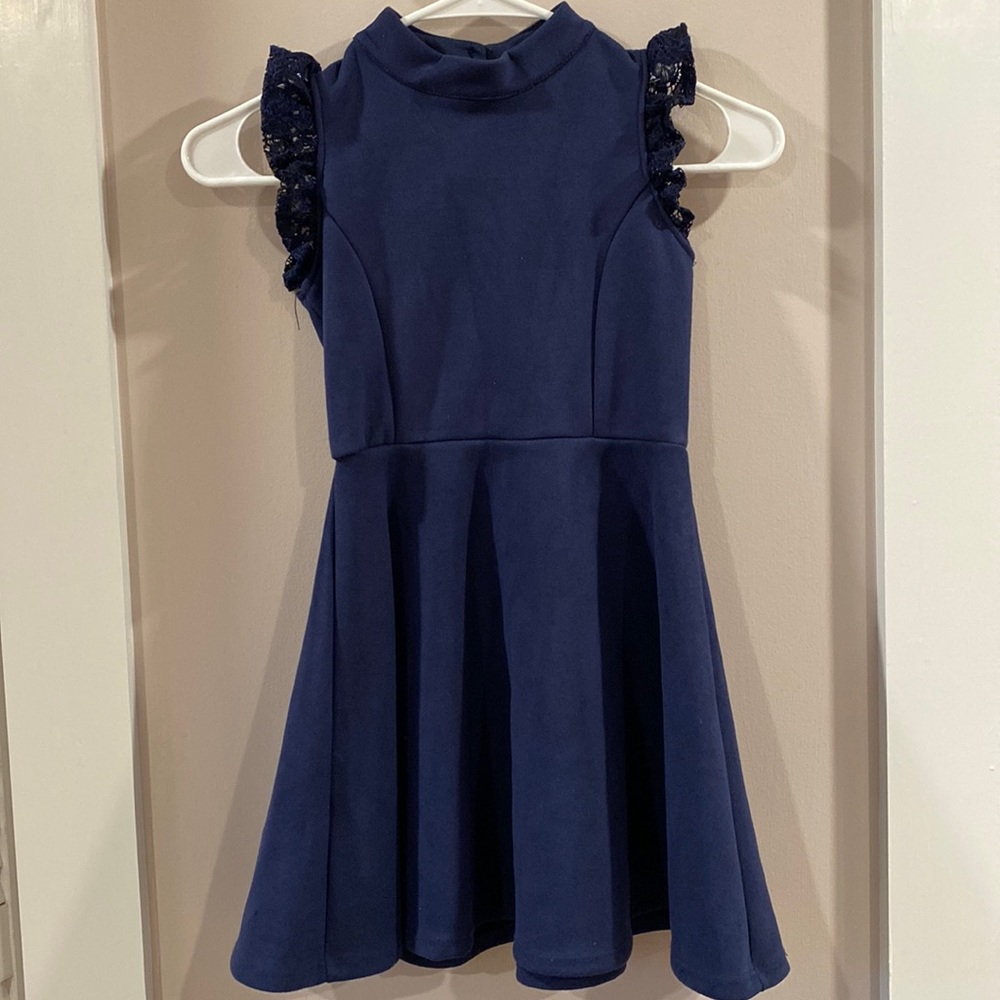 Navy blue twirly microfiber dress with cutout back and lace shoulder detail